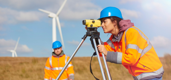 Engineers surveying windfarm in the UK.