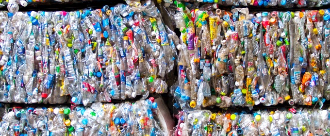 Plastic bottles which have been crushed together into cubes.