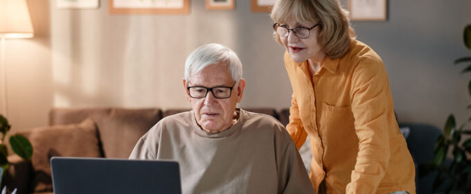 Photograph of two older adults, one man and one woman